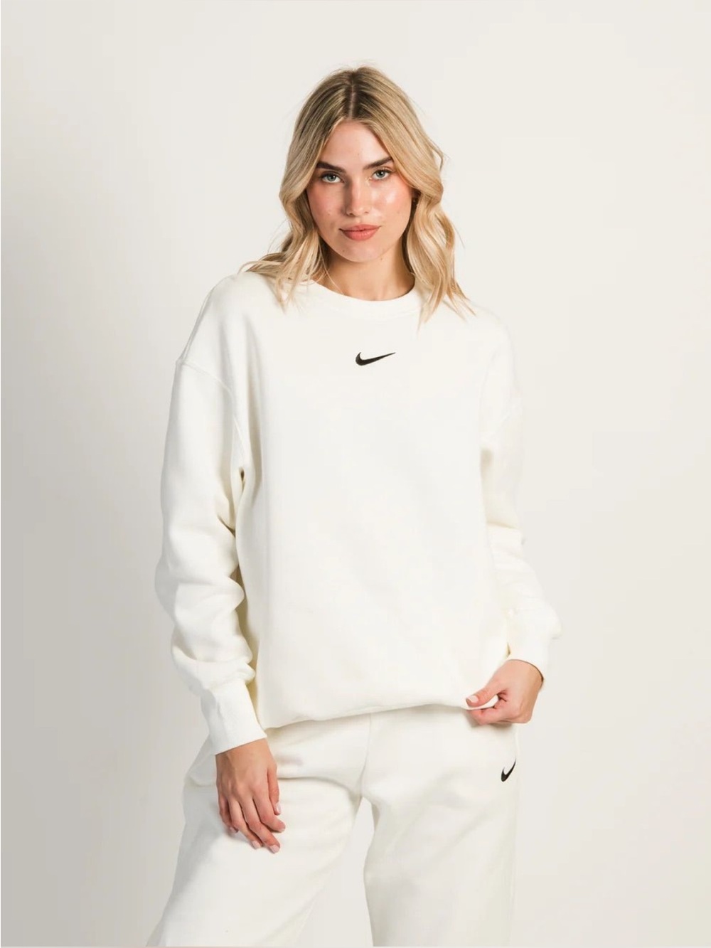 Nike Women's Off-White Crewneck Sweatshirt with Black Swoosh